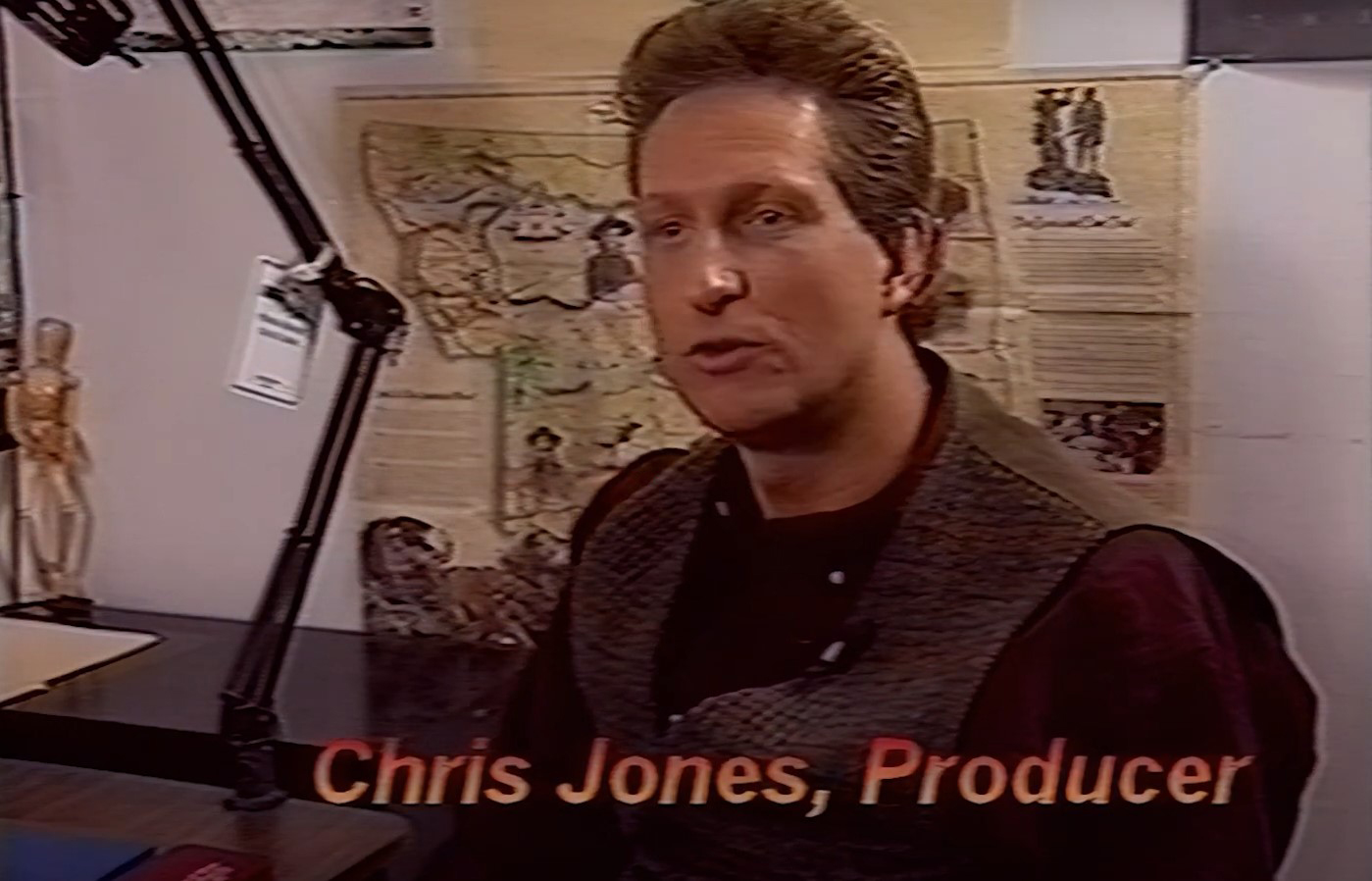 Image of a younger Chris Jones as he talks about computer technology in the making of The Pandora Directive short documentary video made during the original release of The Pandora Directive in 1996.
