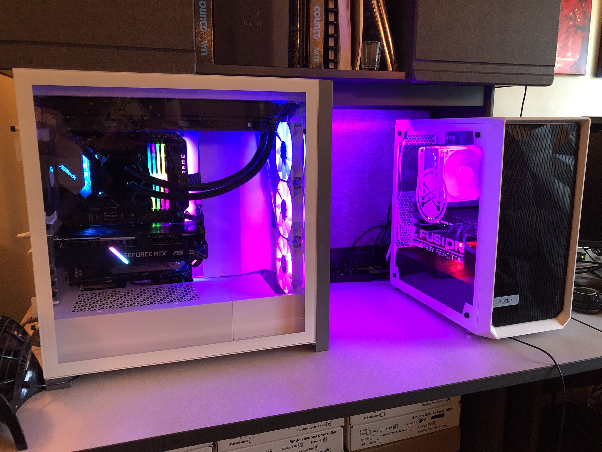 Two rendering machines built specifically for the task of AI. Left Machine: The AI and Machine Learning computer. Right Machine: The editing and project machine. Lots of RGB lights, because they look cool.