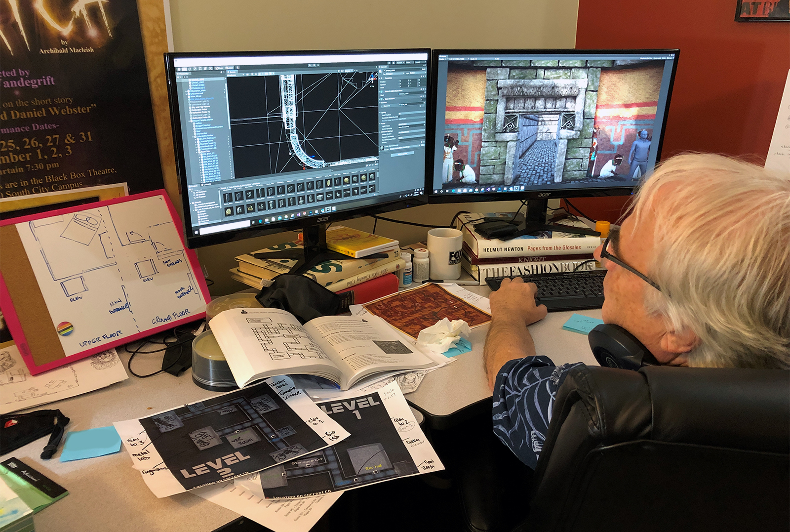 Over the shoulder photo of Doug Vandegrift working on level design. In this image, he is working on the Mayan Temple in Unity.